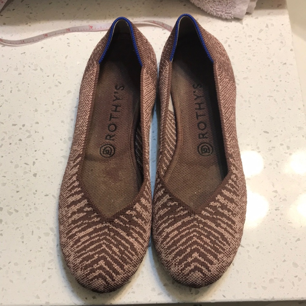 Rothy’s brown zebra w pink metallic undertones  flat